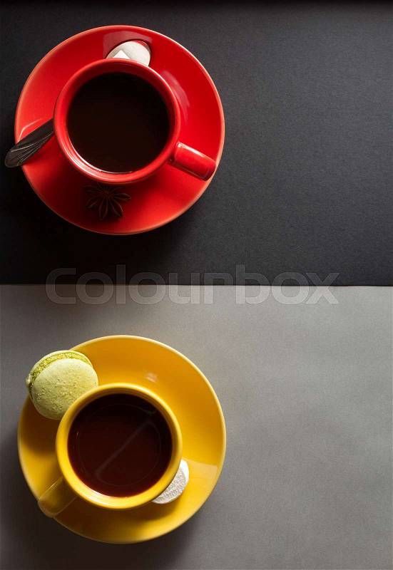 Cup of coffee and cacao at paper background, stock photo
