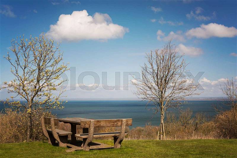 Image of rest stop with a view of the ocean. , stock photo