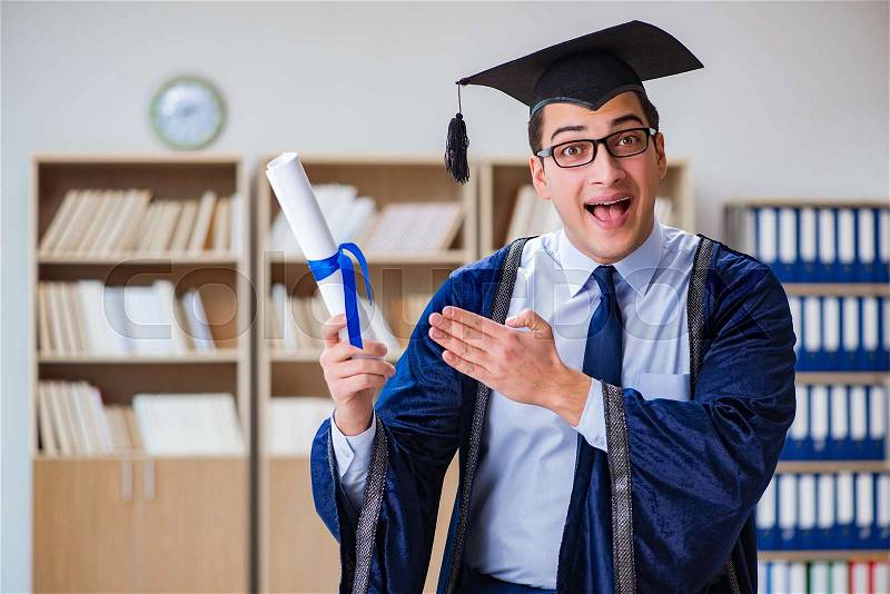 Young man graduating from university, stock photo