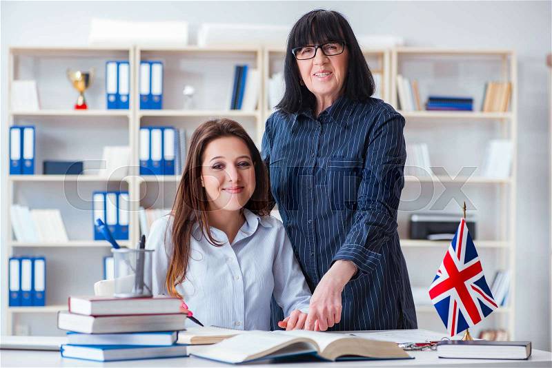Young foreign student during english language lesson, stock photo