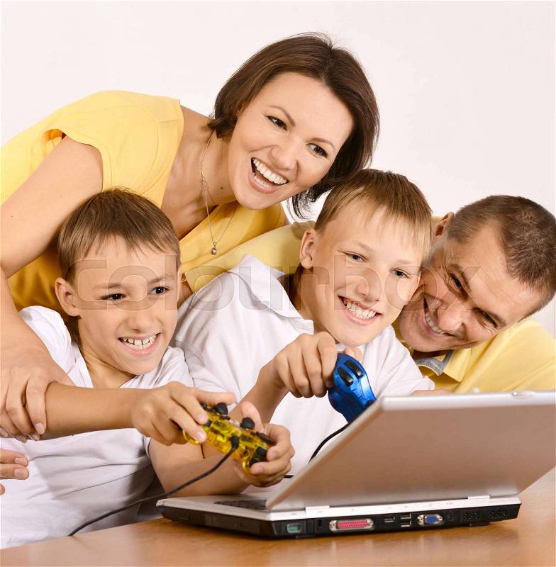 Happy parents with their children spend time at home, stock photo