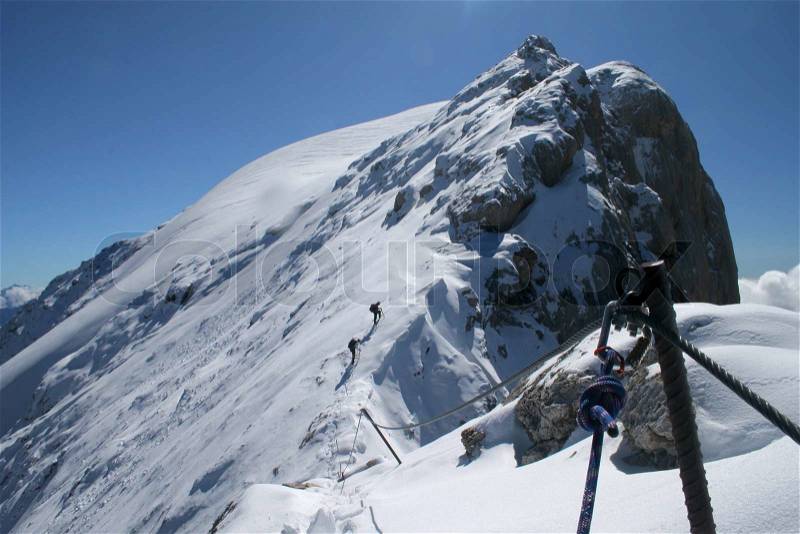 Extreme sport - Mountaneering in winter, stock photo