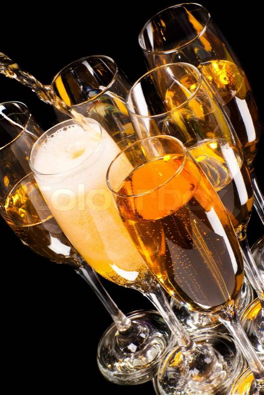 Champagne pour in a glass, stock photo