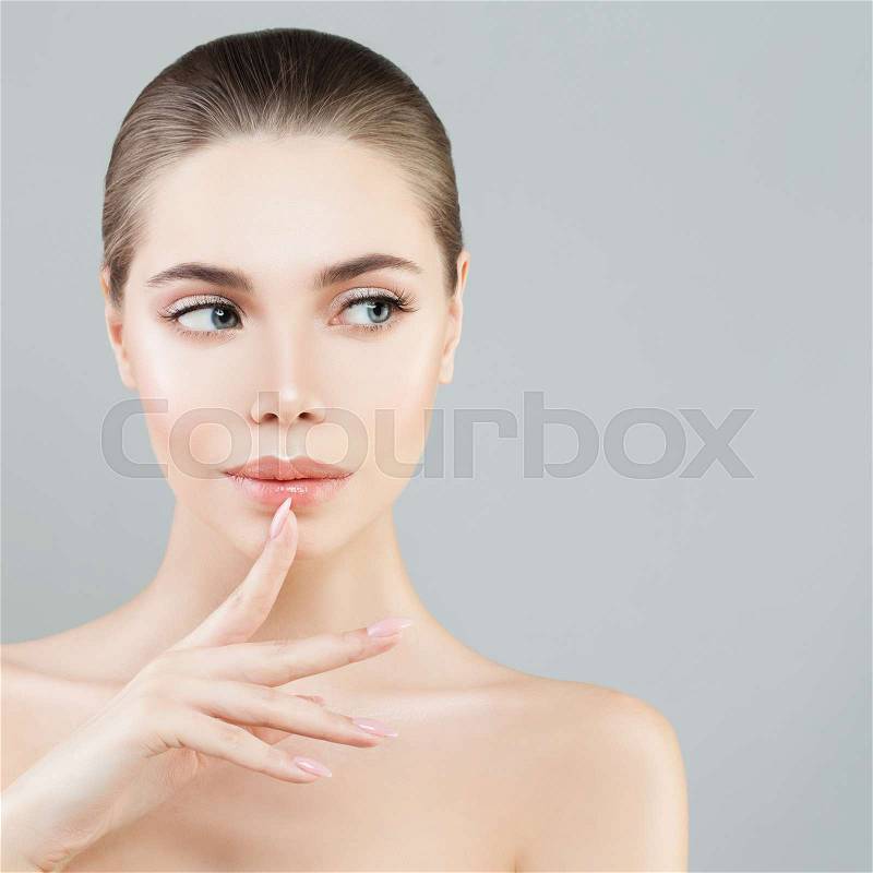 Young Beauty. Cute Model Woman with Healthy Skin and Natural Nude Make up, stock photo