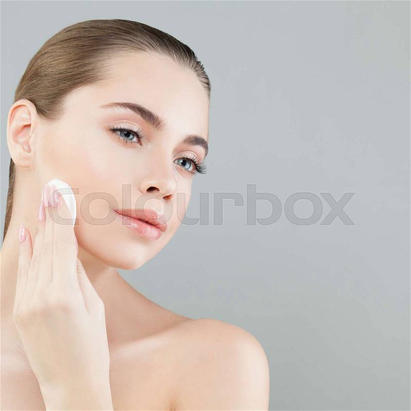 Perfect Healthy Woman with White Cotton Pads. Hygienic, Cleansing and Facial Treatment Concept, stock photo