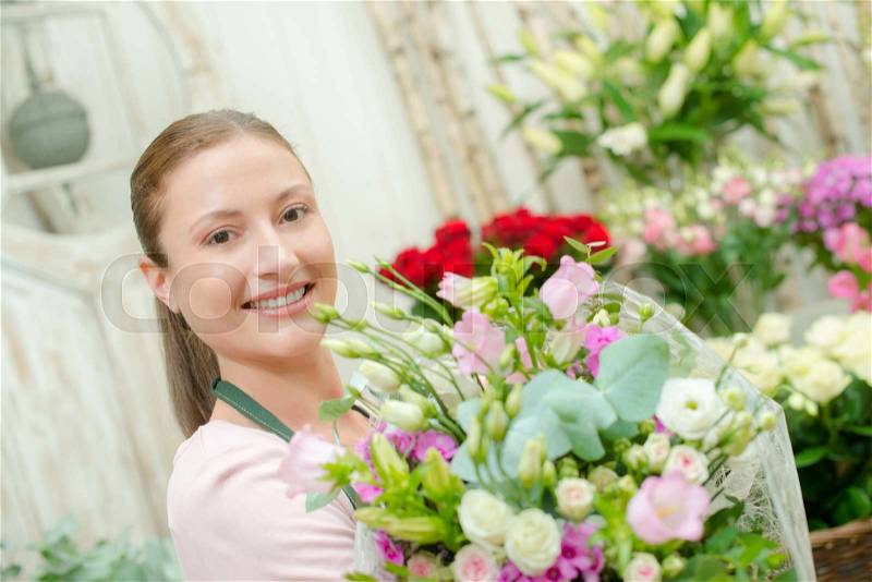 Smiling florist, stock photo