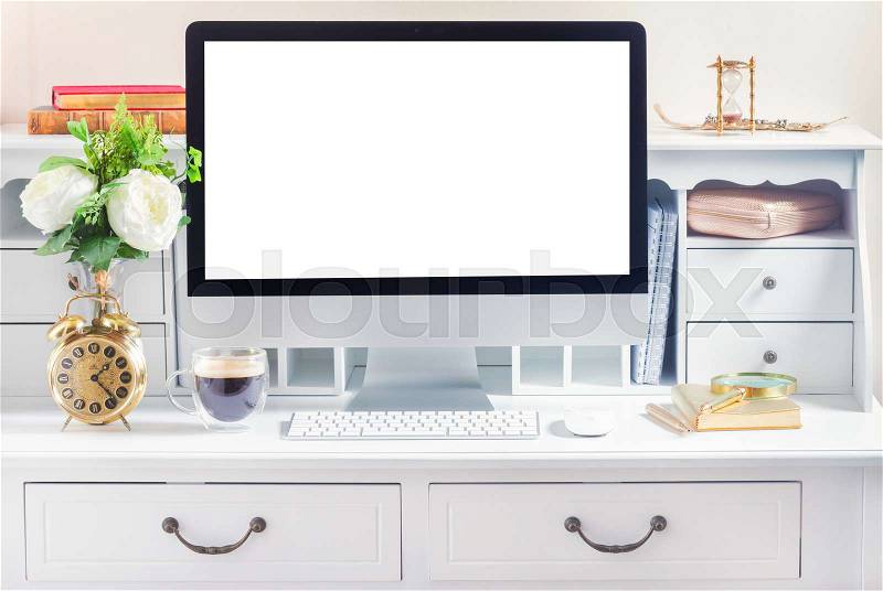 Styled work desk with computer, copy space on screen, stock photo