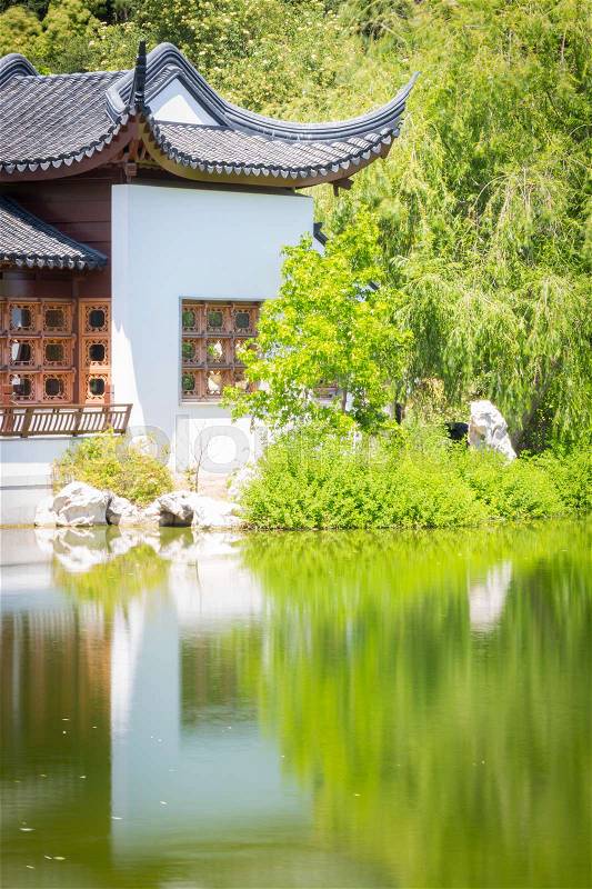Beautiful Chinese Building and Pond, stock photo