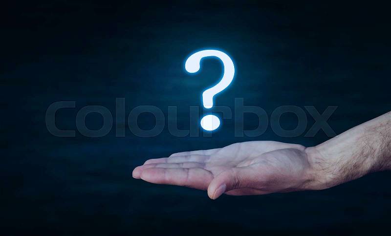 Hand with question mark, stock photo