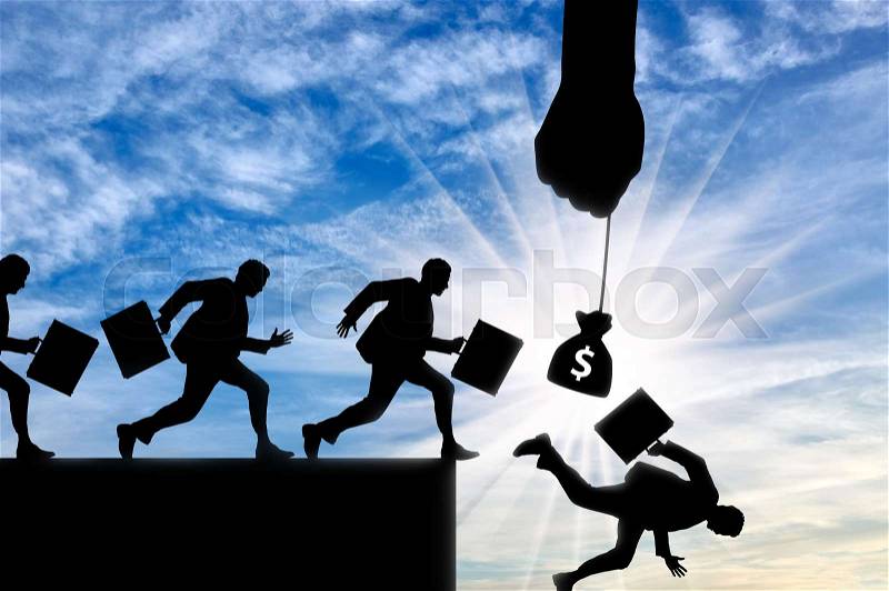 People run after the money that hand holds. Сoncept of manipulation, stock photo