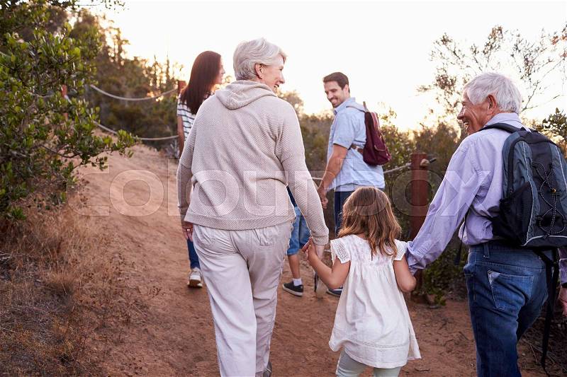 Multi Generation Family On Hike Through Countryside, stock photo