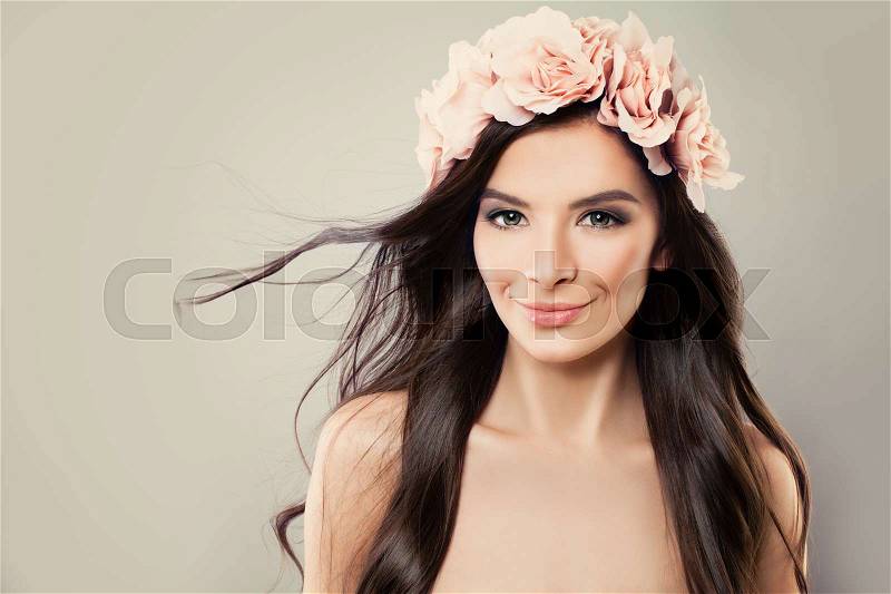 Perfect Fashion Model with Makeup, Flowers and Long Hairstyle, stock photo