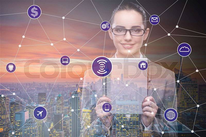 The internet of things concept with businesswoman, stock photo