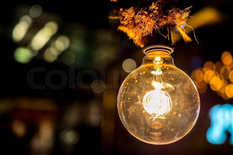 Innovation and illumination light bulb inspiration with bokehs, stock photo