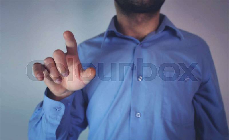 Businessman pointing finger, stock photo