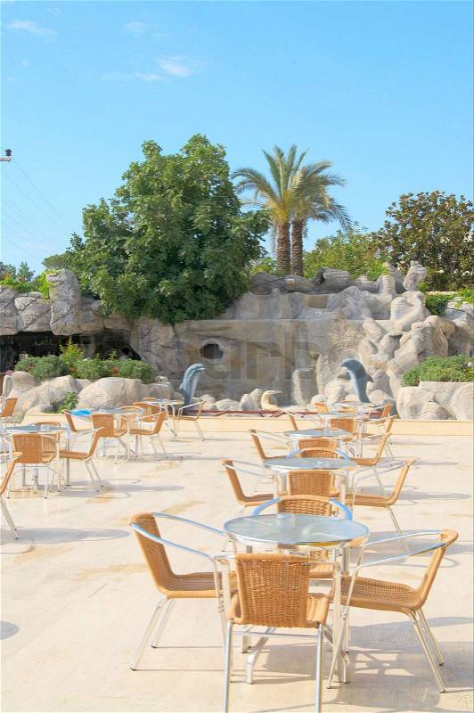 Modern cafe furniture on the resort by summer, stock photo