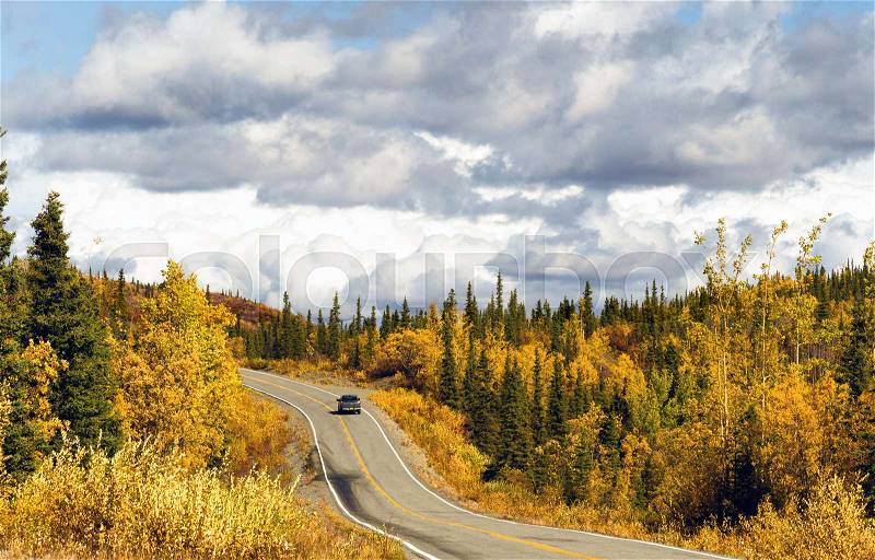 Truck Travels Road Alaska Wilderness Fall Color Two Lane Highway, stock photo