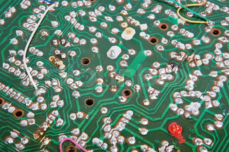 Circuit board super close up toned in green color, stock photo