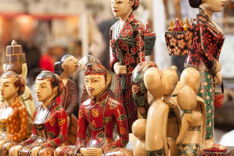 Wooden statue craft made from wood souvenir decoration carving object product from java Indonesia, stock photo