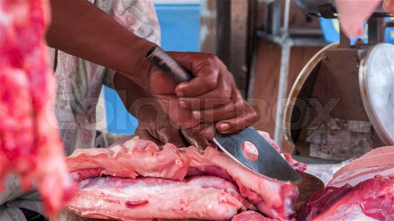 Pork hanging in the cabinet for sale In the local market, Thailand, stock photo