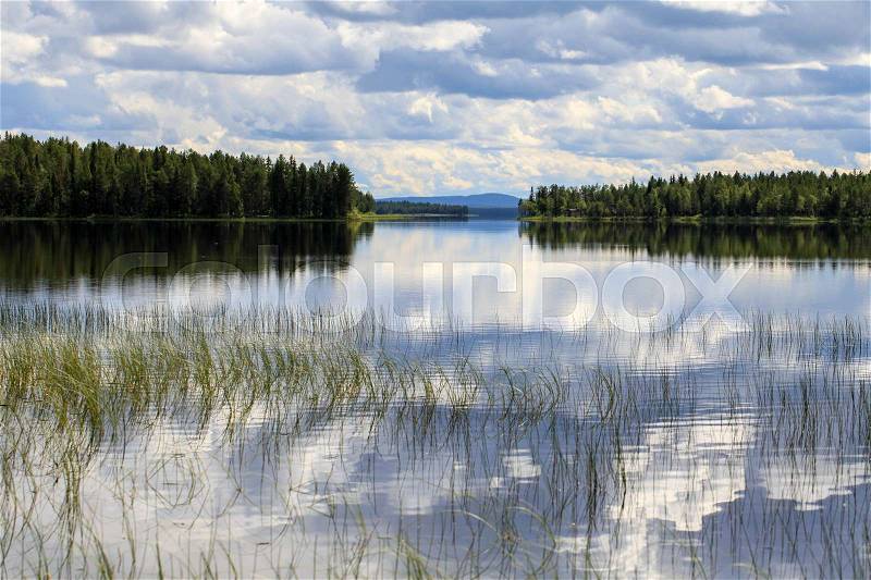 Cloudy day on the lake, Finland, stock photo