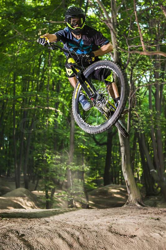 Professional athlete high jump on a mountain bike, stock photo