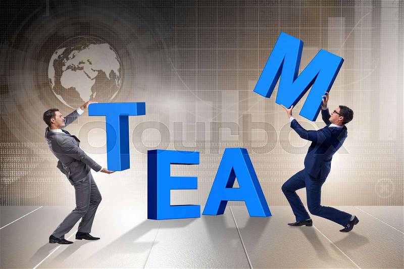 Teamwork concept with businessman putting letters, stock photo