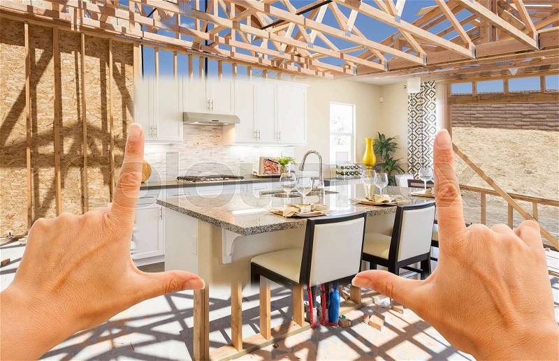 Hands Framing Transition of New Home Kitchen From Framing To Completion, stock photo