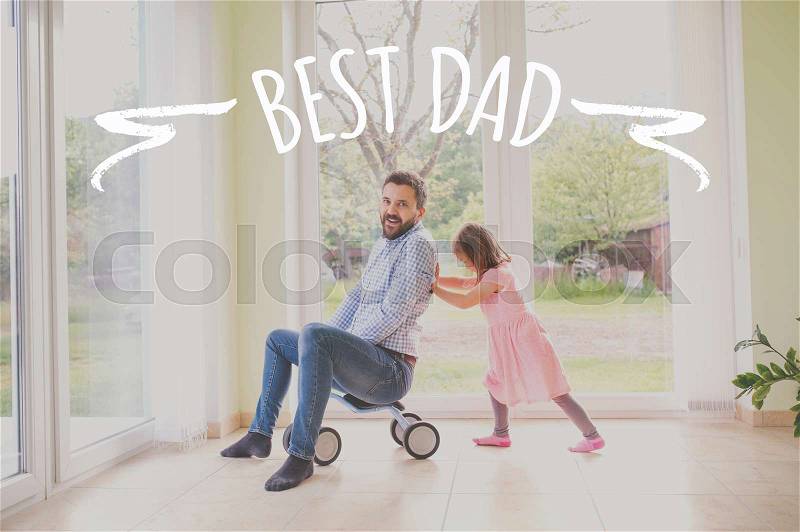 Father and daughter playing together, riding bike indoors. Fathers day concept, stock photo