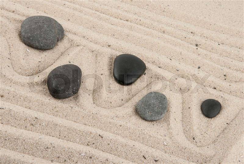 Stones in the sand, stock photo