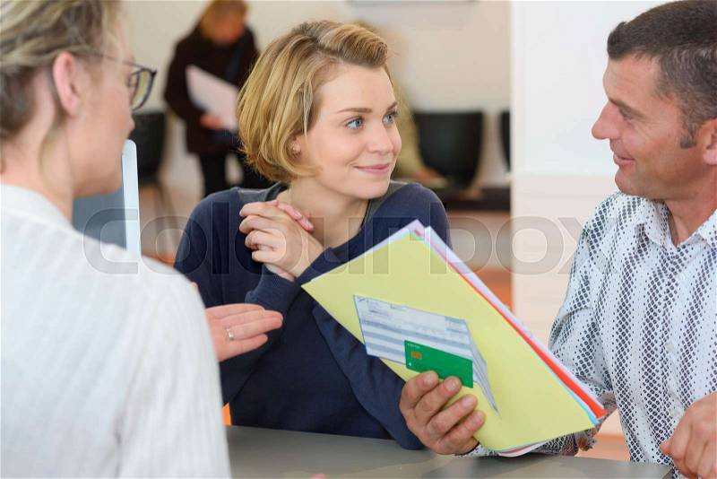 Couple in healthcare meeting, stock photo