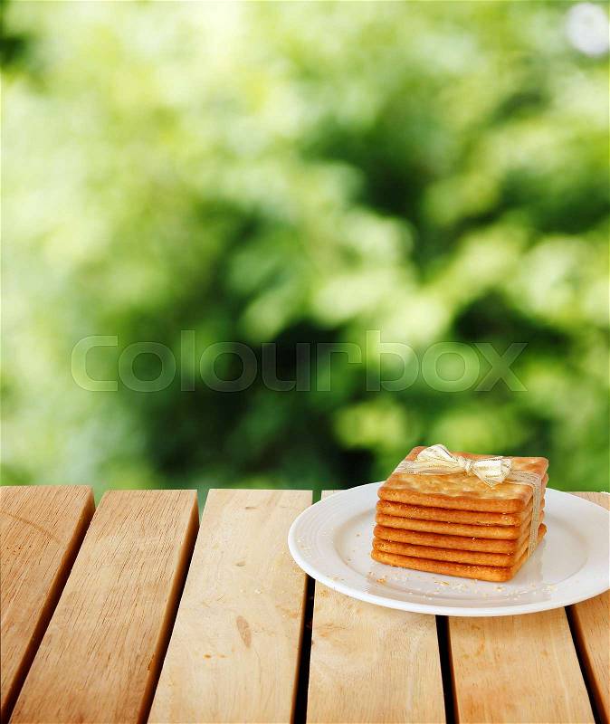 Salty Crackers put on wooden in white background, stock photo