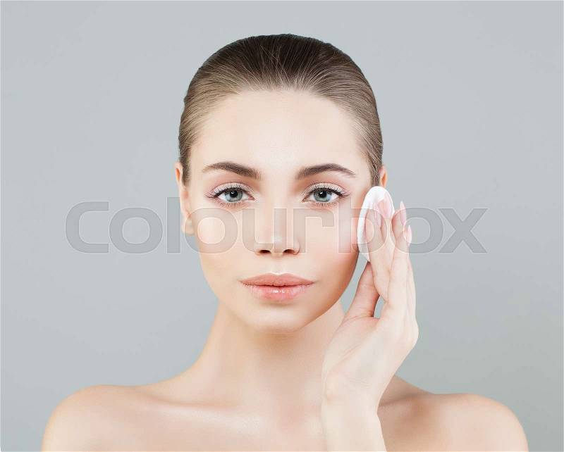 Beautiful Model Woman with Cotton Pads. Hygienic and Facial Treatment Concept, stock photo