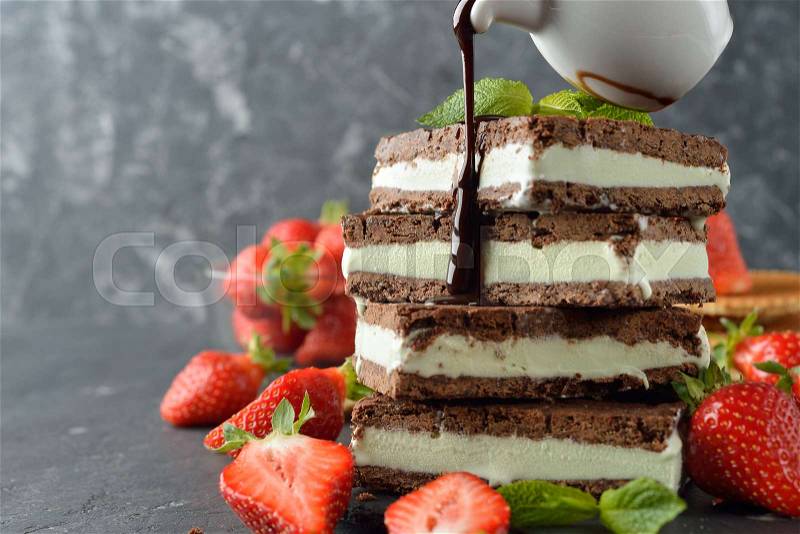 Chocolate ice cream sandwich on a gray background, stock photo