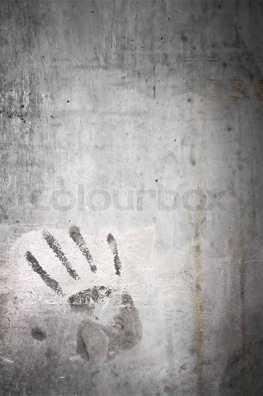 Grungy wall with hand print. It can be used as a backdrop, grungy wallpaper, design t-shirts and more. Fully editable, stock photo