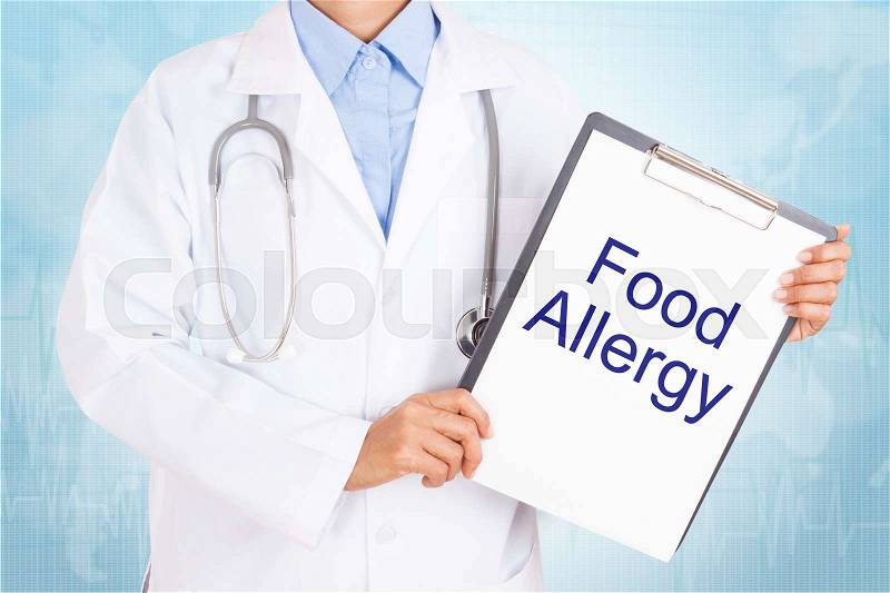 Doctor holding clipboard with food allergy text on a sheet of paper. on white background, stock photo