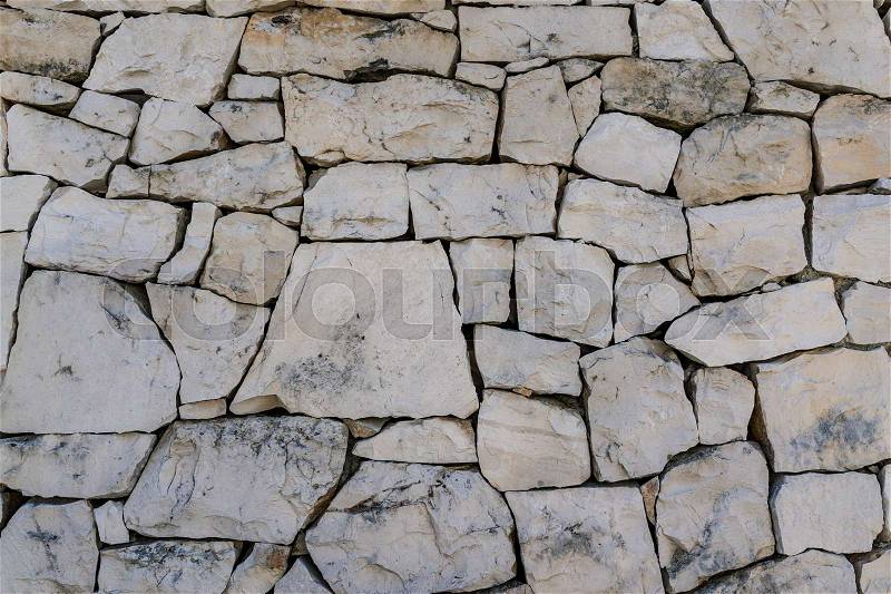 Rustic ancient handcraft tile stack stone wall as background in Italy, stock photo