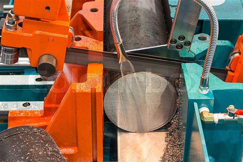 Metalworking equipment,semi-auto bandsaw machine Close up at blade , stock photo