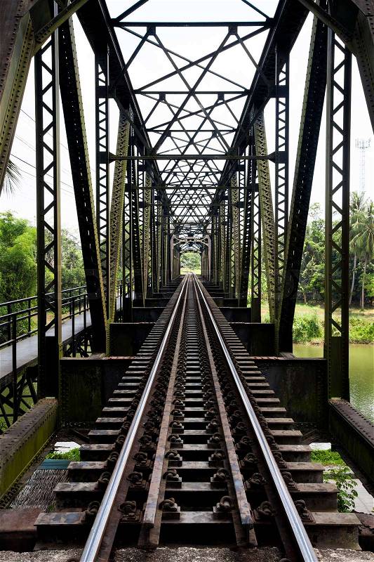 Old rail way bridge vintage , Metal railway bridge ,viaduct Lang Suan Chumphon Thailand, stock photo