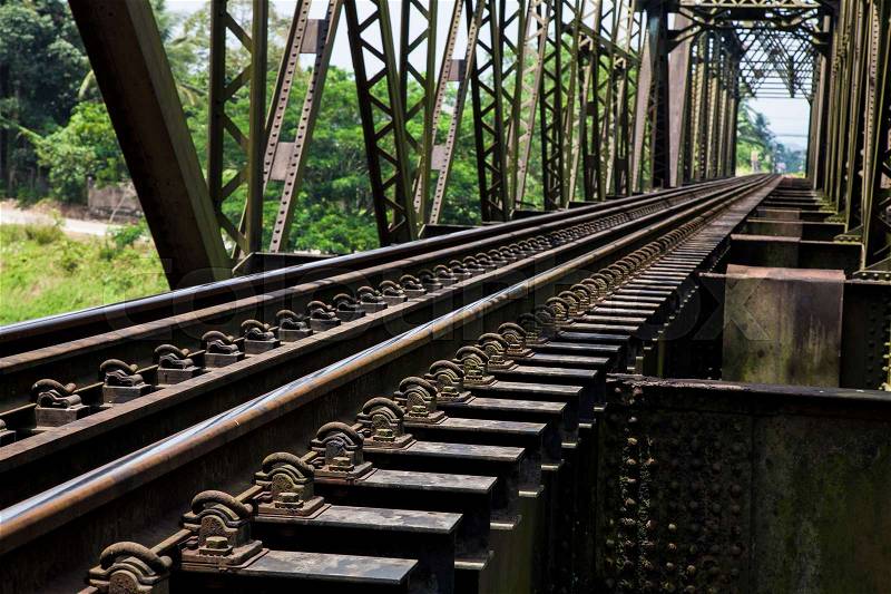 Old rail way bridge vintage , Metal railway bridge ,viaduct Lang Suan Chumphon Thailand, stock photo