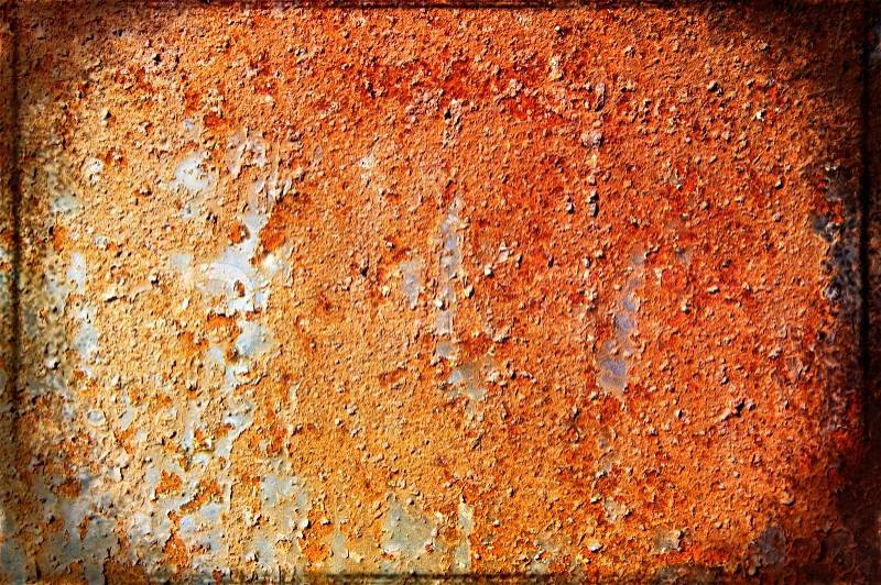 Oxidized metal sheet covered with old paint, stock photo