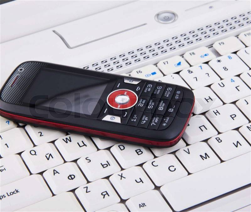 Keyboard and mobile phone background, stock photo