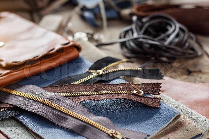 Zip and leather repairing equipment on the table, stock photo