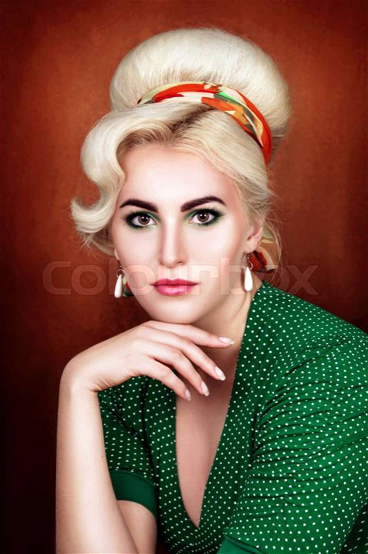 Portrait of a beautiful girl with a retro hairstyle, stock photo