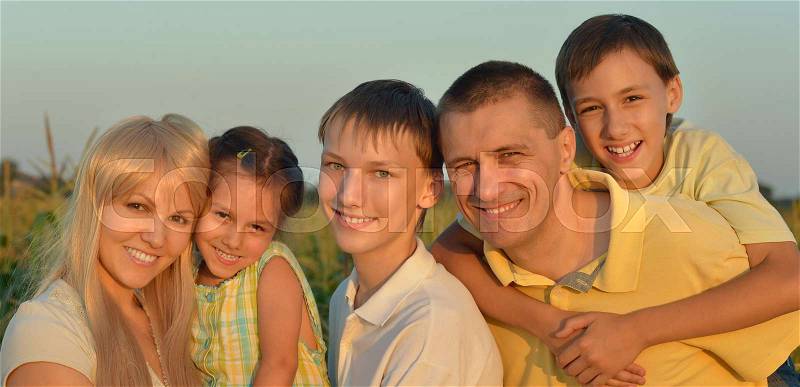 Portrait of a big happy family outdoors, stock photo
