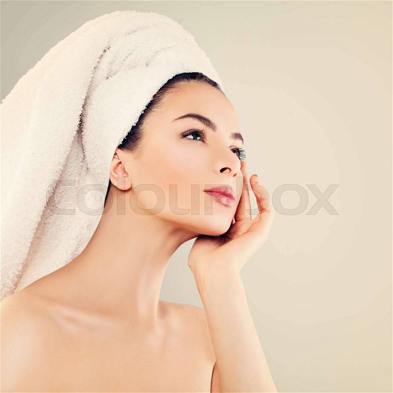 Skincare and Spa Concept. Healthy Spa Woman with Clear Skin touching her Hand her Face, stock photo