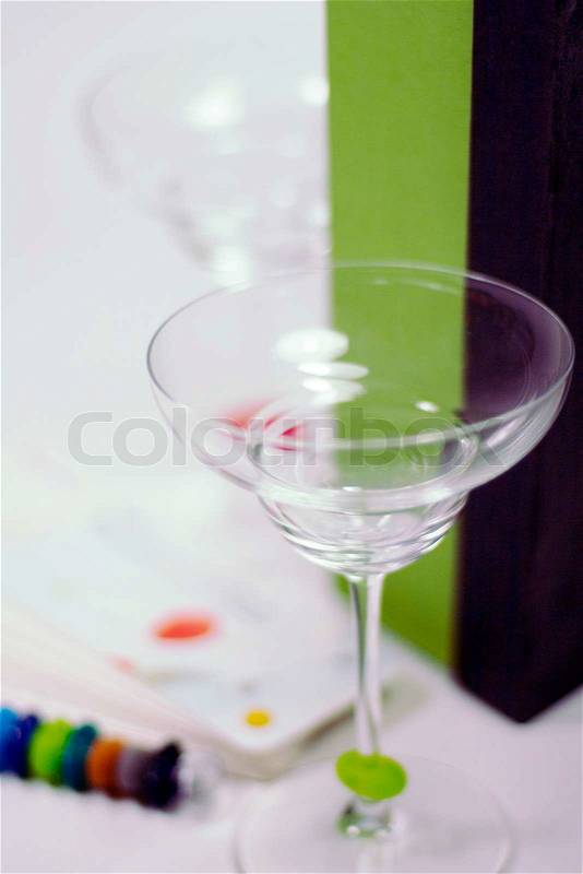 Empty glasses and green gift box, stock photo