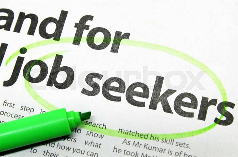 Job seeker circled by green marker on news paper, stock photo