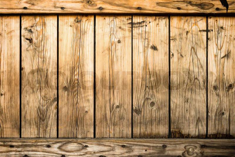 Dark old wood fence from wooden planks for texture and background, stock photo