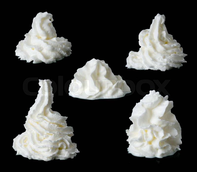 Whipped cream on a black background, stock photo